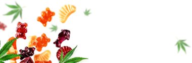 Renkli sakızlar kenevir yaprakları ile birlikte sinek. Cbd yağı ile şekerleme çiğneme, Thc. Arka plan, minimalizm. Afiş