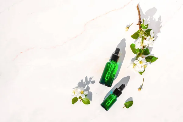 Serum with herbal extracts for skincare. Flat Lay minimalism