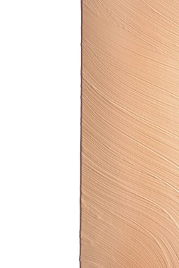 Sıvı temelin dokusu. Yüz sıvısı temel dokusunu kapat. Sıvı temelden yapılmış bir arka plan. Bej sıvısı gizleyici leke, makyaj arkaplanı