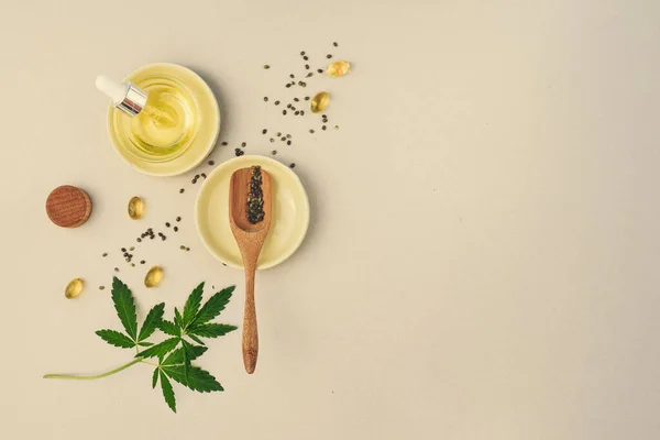 Cbd Oil Tincture Marijuana Leaves Beige Background Cannabis Seeds Wooden — Stock Photo, Image