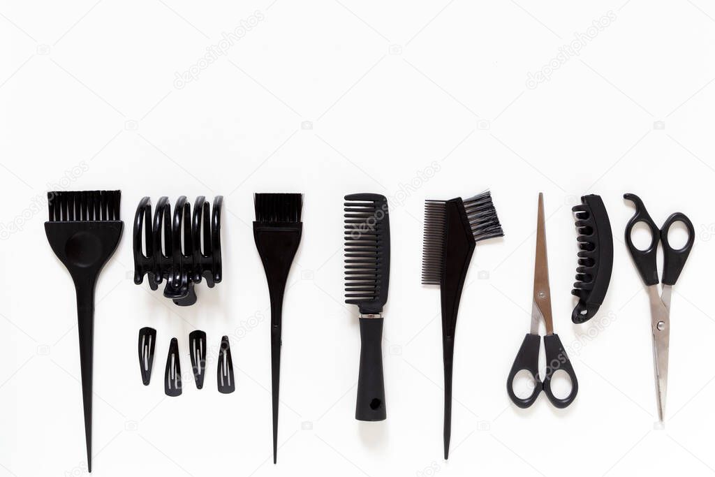 hairdresser equipment placed down on flat lay with copy space.