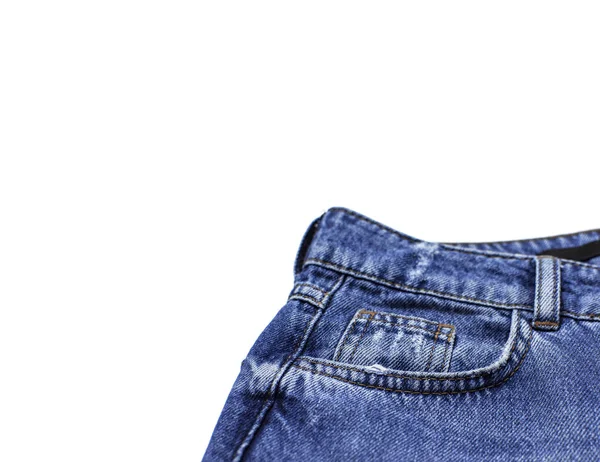 Blue jeans elszigetelt fehér háttér felülnézet lapos feküdt. Szép kék farmer részlete. Farmer textúra vagy farmer háttér. Trend, ruha. Szépség és a divat, ruházat koncepció. — Stock Fotó