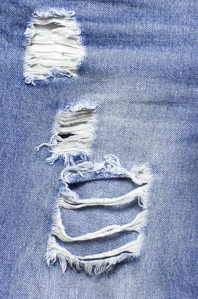 Satu set celana jeans biru yang berbeda. Detail jeans biru yang bagus. Tekstur Jeans atau latar belakang denim. Tekstur jeans denim biru, latar belakang kain grunge. Kecantikan dan fashion, konsep pakaian — Stok Foto