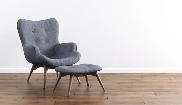 Sillón gris moderno de moda con patas de madera, otomana contra una pared blanca en el interior. Muebles, objetos de interior, sillón de diseño moderno. Interior minimalista con estilo —  Fotos de Stock
