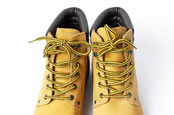 Close-up Yellow mens work boots from natural nubuck leather isolated on white background. Trendy casual shoes, youth style. Concept of advertising autumn winter shoes, sale, shop — Stock Photo, Image