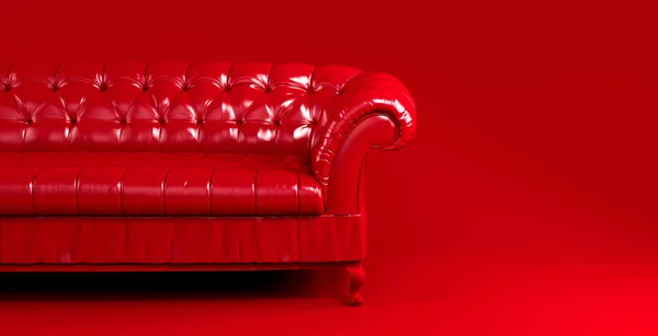 Red quilted leather sofa on red background front view. Creative concept of minimalistic interior, stylish vintage chester sofa. Single piece of furniture. Bright luxury red couch.