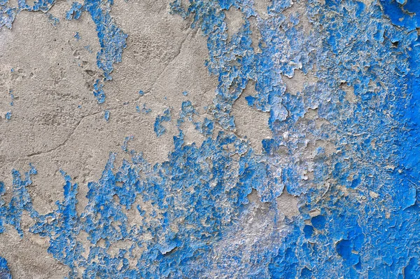 Background image. Old shabby blue painted wall