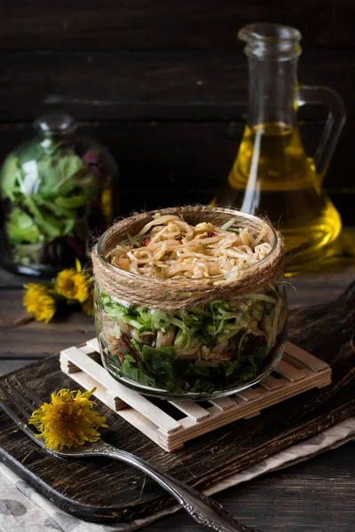 Vegetarian salad from soybean sprouts in a jar