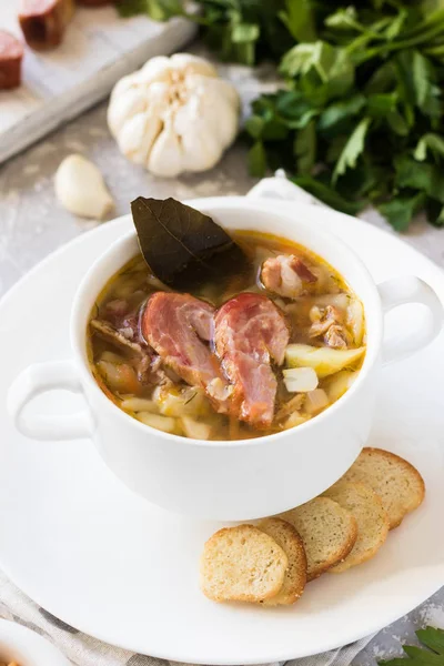 Traditional homemade thick pea soup with smoked meat in a white plate for a family dinner — Stock Image Traditional Homemade Thick Pea Soup Smoked Meat White Plate Family Stock Picture