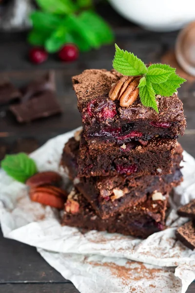 Chocolate brownie with berries and nuts — Stock Photo, Image