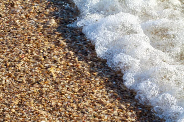 海滩上的海卵石彩色花岗岩 — 图库照片