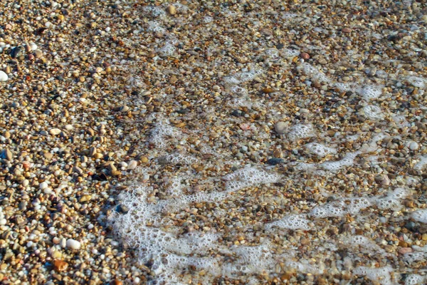 Θάλασσα βότσαλα χρωματισμένο γρανίτη στην παραλία — Φωτογραφία Αρχείου