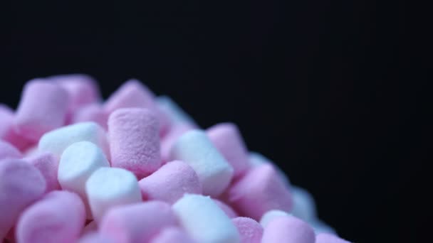 Malvavisco rosa y blanco caramelo rotar fondo . — Vídeos de Stock