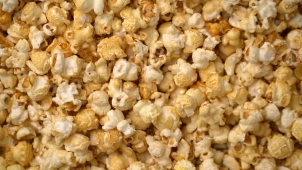 Popcorn drehen Bewegungshintergrund. — Stockvideo