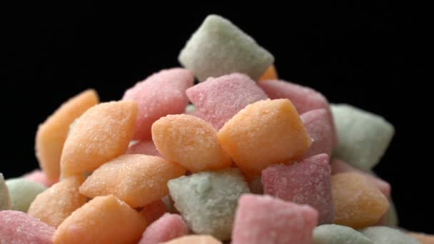 Bonbons sucrés tampons Mélange de collation sucre fond rotatif — Video