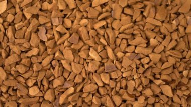 Görüntüleri kahve granül dönen arka plan.