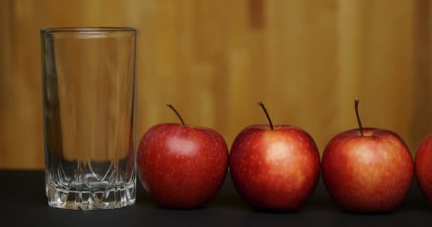 Concept stop motion animation apple and juice. — Stock Video