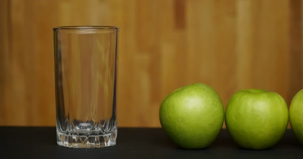 Concept stop motion animation apple and juice. — Stock Video