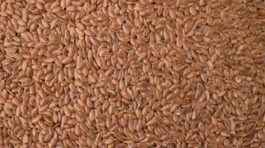 arka plan dönen birçok keten tohumu