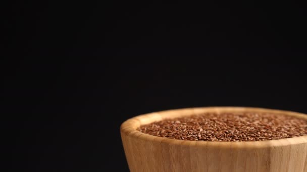 Flax seeds rotating background — Stock Video