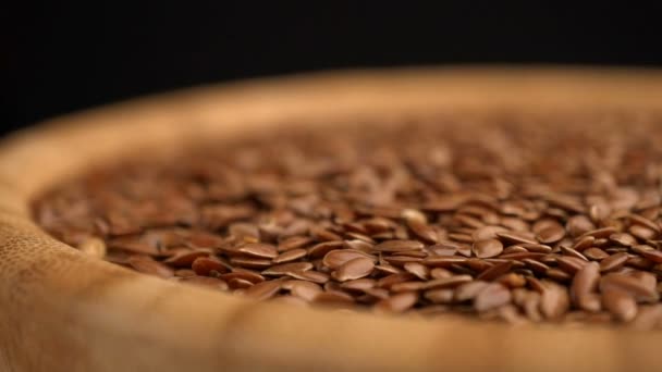 Flax seeds rotating background — Stock Video