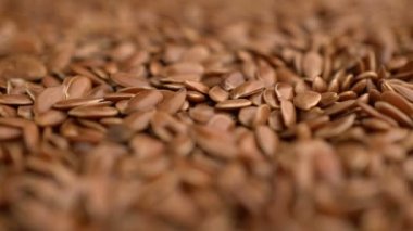 arka plan dönen birçok keten tohumu