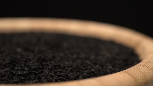 Black cumin or caraway heap rotating — Stock Video