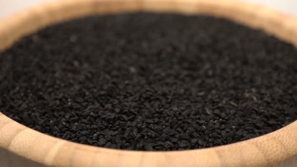 Black cumin or caraway heap rotating — Stock Video