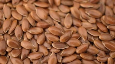 arka plan dönen birçok keten tohumu