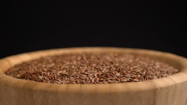 Many flax seeds rotating background — Stock Video