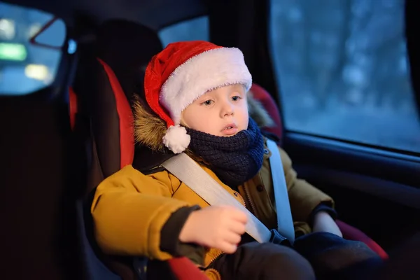 Little Boy Santa Hat Sitting Car Seat Goes Car Christmas — Stock Photo, Image