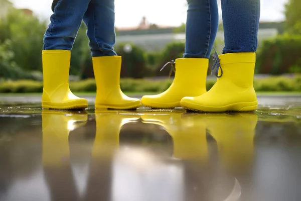 Mother Child Yellow Boots Playing Puddle Summer Day Outdoors Activities — Stock Photo, Image