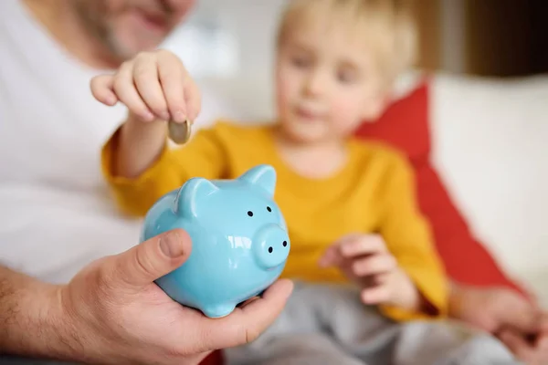 Father Son Putting Coin Piggy Bank Education Children Financial Literacy — Stock Photo, Image