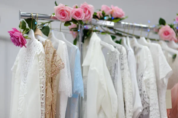 Few Beautiful Wedding Bridesmaid Evening Dresses Ball Gown Hanger Bridal — Stock Photo, Image