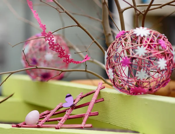 Easter decorations on the street of small town in France. Easter painted eggs and butterfly. — Stock Photo, Image