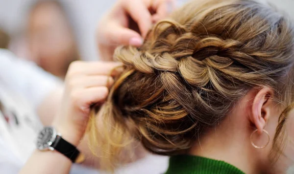 Young woman getting her hair done before party — Stock Photo, Image