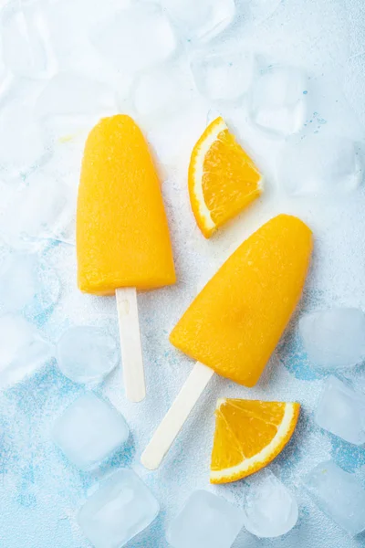 Orange Popsicles Juice Blue Background Ice Pops Flat Lay Top — Stock Photo, Image