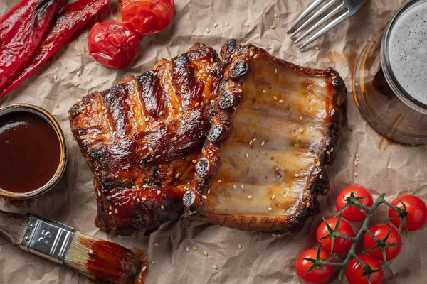 Closeup Pork Ribs Grilled Bbq Sauce Caramelized Honey Paper Tasty — Stock Photo, Image