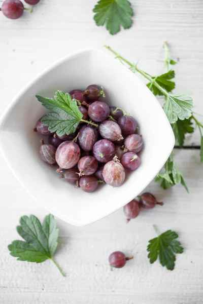 Top View Bunch Red Gooseberries White Bowl — Stock Photo, Image