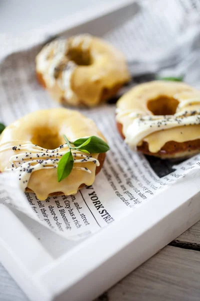 Lemon Donuts White Chocolate Poppy Seeds Served Newspaper — Stock Photo, Image