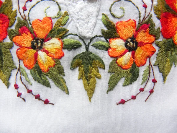 Ukrainian embroidery, embroidered delicate flowers on a white background