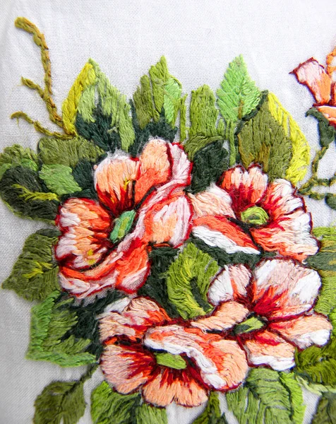 Ukrainian embroidery, embroidered delicate flowers on a white background