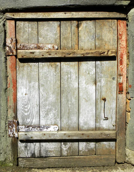 old wooden door with a simple lock