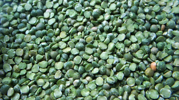 dried green peas, textured kitchen background