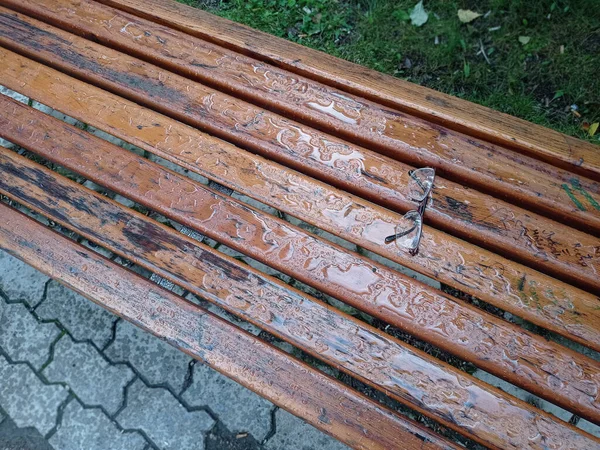 Glasses Forgotten Park Bench Rain Water Drops — Stock Photo, Image