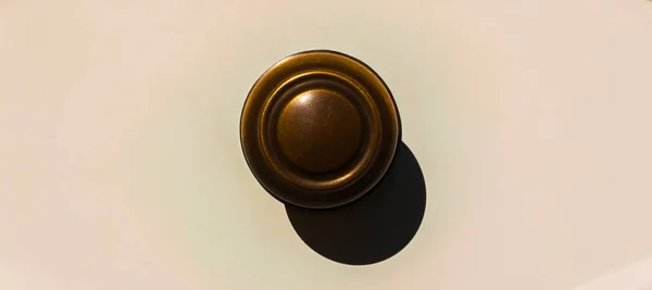 close up on a round door handle with decorative elements, door decoration, vintage
