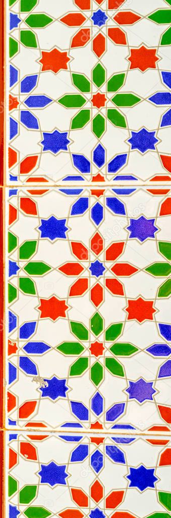 Traditional ornamental Spanish decorative tiles, original ceramic tiles on the walls of buildings, decoration