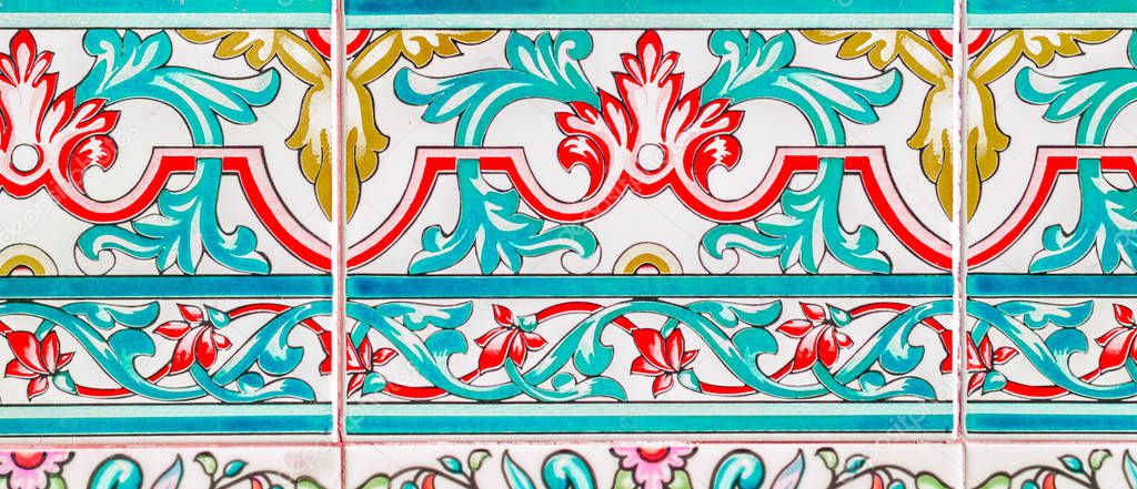 Traditional ornamental Spanish decorative tiles, original ceramic tiles on the walls of buildings, decoration