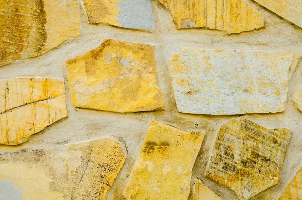 Старый Камень Помещен Стену Интересный Оригинальный Фон Сплошная Стена — стоковое фото