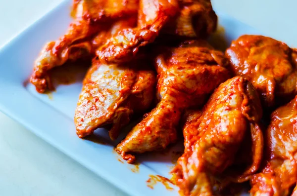 chicken wings marinated in a barbecue sauce, a typical American snack, delicious food